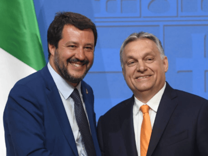 Italian Deputy Premier and Interior Minister Matteo Salvini (L) is welcomed by Hungarian P