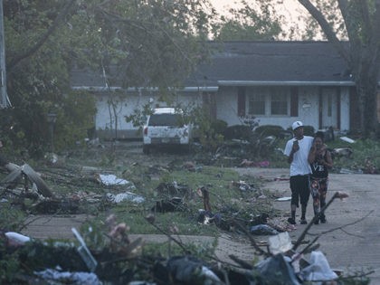 TROTWOOD, OH - MAY 28: Residents of the Trotwood neighborhood West Brook inspect the damage to their homes following powerful tornados on May 28, 2019 in Trotwood, Ohio. (Photo by Matthew Hatcher/Getty Images)