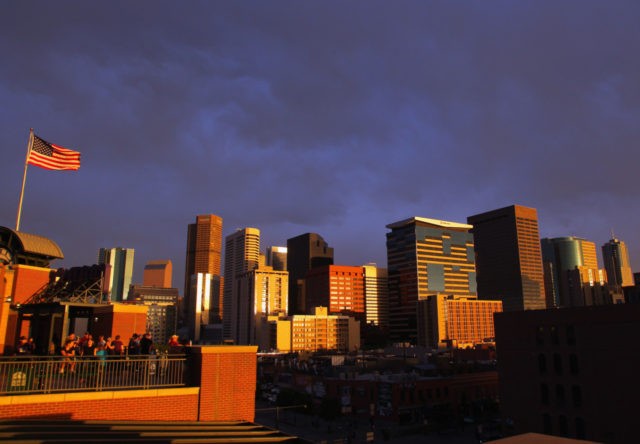 DENVER, CO - MAY 05: Sun sets on downtown Denver as see from Coors Field in LoDo as the A