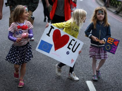 LONDON, ENGLAND - JULY 02: Two young girls hold placards as tens of thousands of people march through central London in a 'March For Europe Event' on July 2, 2016 in London, England. The march is in protest at the result of the EU referendum. (Photo by Dan Kitwood/Getty Images)
