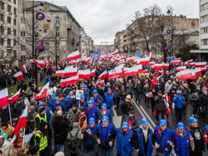 Supporters of Poland's ruling party Law and Justice (PiS) rally for a pro-government demonstration, December 13, 2015 in Warsaw. AFP PHOTO / WOJTEK RADWANSKI / AFP / WOJTEK RADWANSKI (Photo credit should read WOJTEK RADWANSKI/AFP/Getty Images)