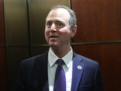 WASHINGTON, DC - FEBRUARY 05: Rep. Adam Schiff (D-CA), ranking member of the House Permanent Select Committee on Intelligence, answers brief questions from the media while boarding an elevator at the U.S. Capitol February 5, 2018 in Washington, DC. The House Permanent Select Committee on Intelligence is scheduled to meet …