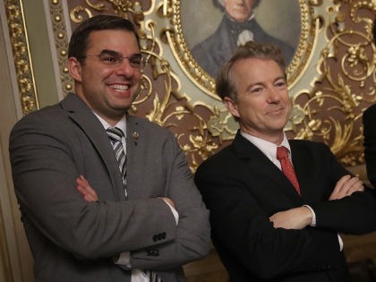 WASHINGTON, DC - FEBRUARY 08: Sen. Rand Paul (C) (R-KY) takes a brief break from the floor of the U.S. Senate to pose for a photo with Rep. Justin Amash (L) (R-MI) and Rep. Thomas Massie (R) (R-KY) at the U.S. Capitol February 8, 2018 in Washington, DC. Paul is …