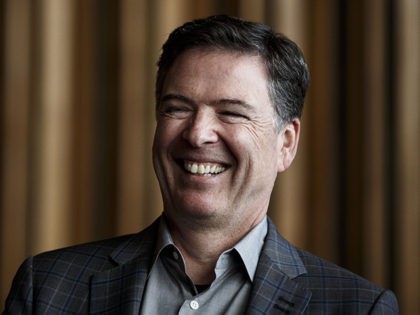 BERLIN, GERMANY - JUNE 19: Former FBI Director James Comey talks backstage before a panel