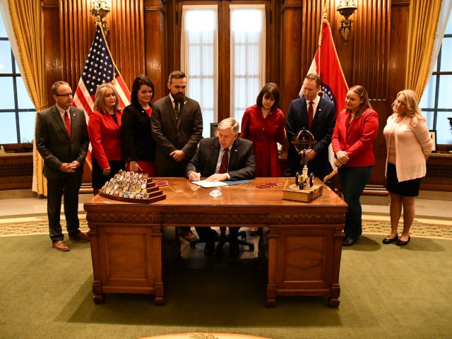 Missouri Gov. Mike Parson signed an abortion bill into law Friday, banning abortions at eight weeks of pregnancy and asserting that the state is a “sanctuary of life.”