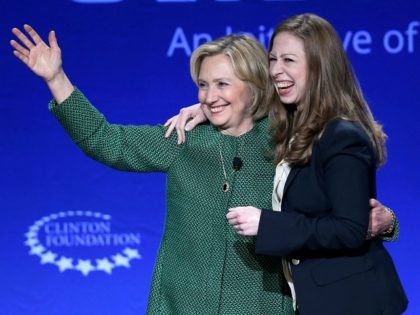 CORAL GABLES, FL - MARCH 07: Hillary Rodham Clinton, Former U.S. Secretary of State and U.S. Senator from New York (L) and her daughter Chelsea Clinton, Vice Chair, Clinton Foundation embrace as they attend the 2015 Meeting of Clinton Global Initiative University at the University of Miami on March 7, …