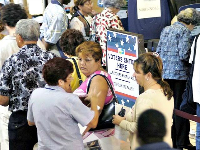 Hispanic voters go to the polls for early voting at the Miami-Dade Government Center in Miami on Oct. 21, 2004.Gaston De Cardenas / Getty Images