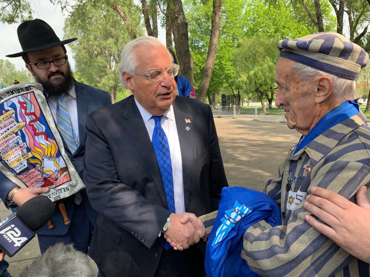 US Ambassador David Friedman greets Holocaust survivor Edward Mossberg, 93, who wears his original concentration camp uniform every year for the March of the Living and was awarded Poland’s Order of Merit yesterday