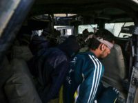 Blindfolded suspected Islamic State group (IS) jihadists sit in a Humvee, after they were captured by Iraqi forces near the ancient town of Nimrud, located 30 kilometres south of Mosul in the Nineveh province, on November 15, 2016. Iraqi forces announced that Nimrud, which was founded in the 13th century …