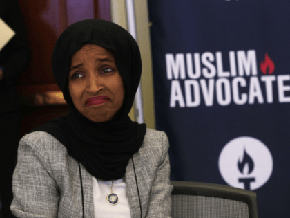 U.S. Rep. Ilhan Omar (D-MN) reacts as she listens to remarks during a congressional Iftar event at the U.S. Capitol May 20, 2019 in Washington, DC. Muslims around the world are observing the holy month with prayers, fasting from dawn to sunset and nightly feasts. (Photo by Alex Wong/Getty Images)