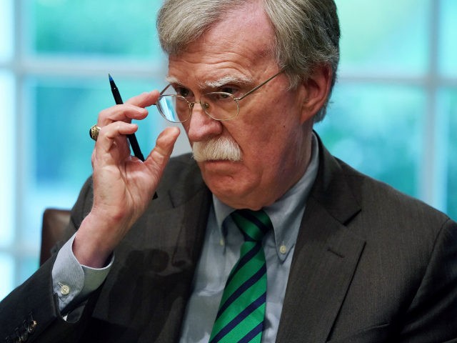 U.S. National Security Advisor John Bolton joins President Donald Trump and NATO Secretary General Jens Stoltenberg during a bilateral meeting in the Cabinet Room at the White House April 02, 2019 in Washington, DC. On the 70th anniversary of NATO, Trump and Stoltenberg discussed the trans-Atlantic alliance's successes and its …