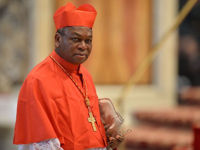 Nigerian cardinal John Onaiyekan attends a mass at the St Peter's basilica before the conc