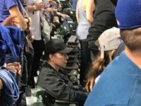 Johncusacksitting1