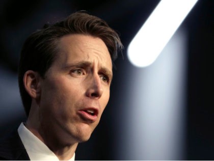 Republican Senate candidate Josh Hawley waves as he comes onto the stage during a rally hosted by the American Conservative Union Friday, Nov. 2, 2018, in Kansas City, Mo. Hawley is challenging Missouri Democratic Sen. Claire McCaskill. (AP Photo/Charlie Riedel)