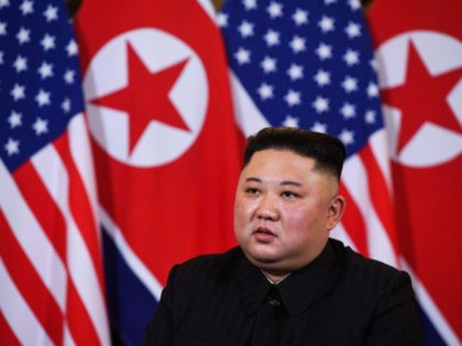 North Korea's leader Kim Jong Un listens to US President Donald Trump (not pictured) during a meeting at the Sofitel Legend Metropole hotel in Hanoi on February 27, 2019. (Photo by Saul LOEB / AFP) (Photo credit should read SAUL LOEB/AFP/Getty Images)