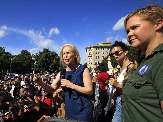 Sen. Kirsten Gillibrand, D-N.Y., with actress and comedian Amy Schumer, right, and actress