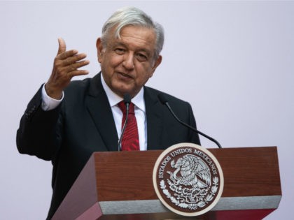López-Obrador-podium-hand-up-getty Mexican President Andres Manuel Lopez Obrador delivers his report on the first 100 days of government, at the National Palace in Mexico City on March 11, 2019. - It has been a frenetic first 100 days for Mexican President Andres Manuel Lopez Obrador, though his sometimes chaotic attempts to deliver …