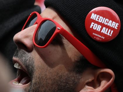 WASHINGTON, DC - APRIL 29: Protesters supporting “Medicare for All” hold a rally outside PhRMA headquarters April 29, 2019 in Washington, DC. The rally was held by the group Progressive Democrats of America. (Photo by Win McNamee/Getty Images)