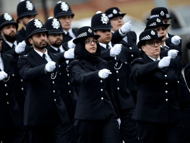 LONDON, ENGLAND - APRIL 21: New Police recruits take part in a passing-out parade at the M