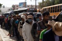 Migrants Walk Across Border
