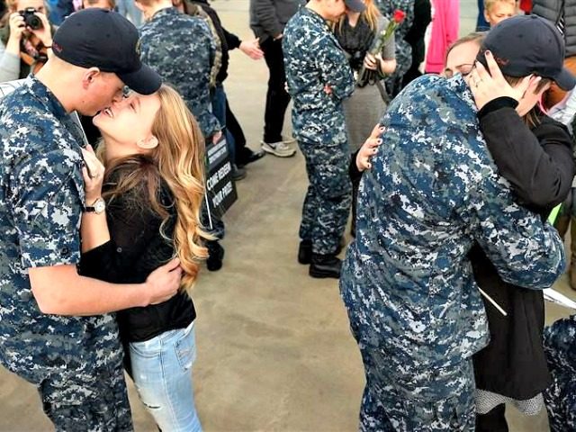 Military families reunited last month at a Navy submarine base in Groton, Connecticut, following a deployment. Laws recently passed in all states were aimed at making it easier for military spouses to stay in their career as their families move from state to state.