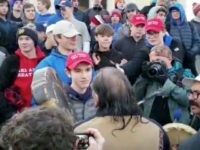 Nick Sandmann and Nathan Phillips in Covington Catholic High School confrontation