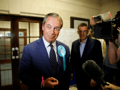 Brexit Party leader Nigel Farage reacts after the European Parliament election results for