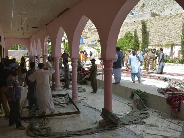Pakistani officials examine a mosque following a bomb blast in Quetta, Pakistan, Friday, May 24, 2019. (AP Photo/Arshad Butt)
