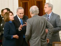 (L-R) U.S. House Minority Leader Nancy Pelosi (D-CA), Senate Minority Leader Chuck Schumer (D-NY), Senate Minority Leader Mitch McConnell (R-KY) and House Majority Leader Kevin McCarthy (R-CA) talk at a reception held by President Donald Trump for House and Senate Republican and Democratic leaders in the State Dining Room of …