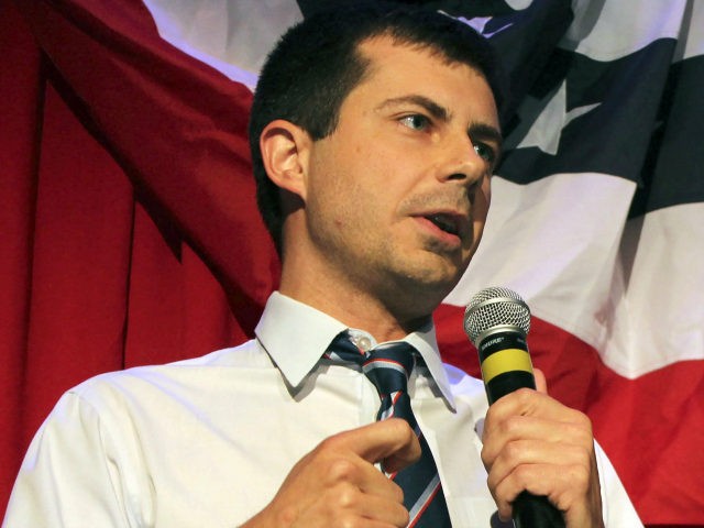 In this file photo taken on September 26, 2016 Sound Bend Indiana Mayor Peter Buttigieg talks about Republican Vice-presidential candidate Mike Pence in front of potential voters at a Hillary Clinton debate watching party for the LGBT community in Chicago, Illinois. - He is a longshot candidate, but South Bend …