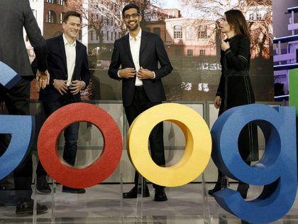 BERLIN, GERMANY - JANUARY 22: Philipp Justus (L), Vice President Google Central Europe, Sundar Pichai (C), CEO of Google and Senior Director Public Policy and Government Relations Annette Kroeber-Riel (R) pose for the media before the festive opening of the Berlin representation of Google Germany on January 22, 2019 in …