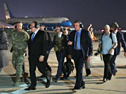 US Secretary of State Mike Pompeo (2nd L) and Lt General Paul LeCamera (L) make their way to board a helicopter in Baghdad on May 7, 2019. - Pompeo is scheduled to meet with the Iraqi prime minister and president. (Photo by MANDEL NGAN / POOL / AFP) (Photo credit …