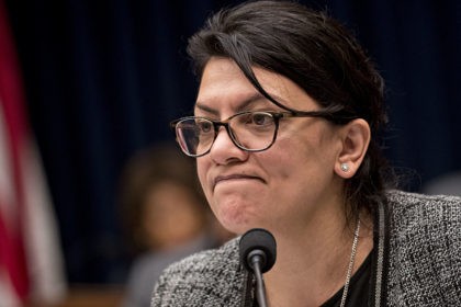 Representative Rashida Tlaib, a Democrat from Michigan, pauses while questioning Tim Sloan, president and chief executive officer of Wells Fargo & Co., not pictured, during a House Financial Services Committee hearing in Washington, D.C., U.S., on Tuesday, March 12, 2019. Wells Fargo & Co. stock is underperforming Tuesday pre-market as …