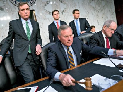 Senate Intelligence Chairman Richard Burr, R-N.C., center, accompanied by Committee Vice C