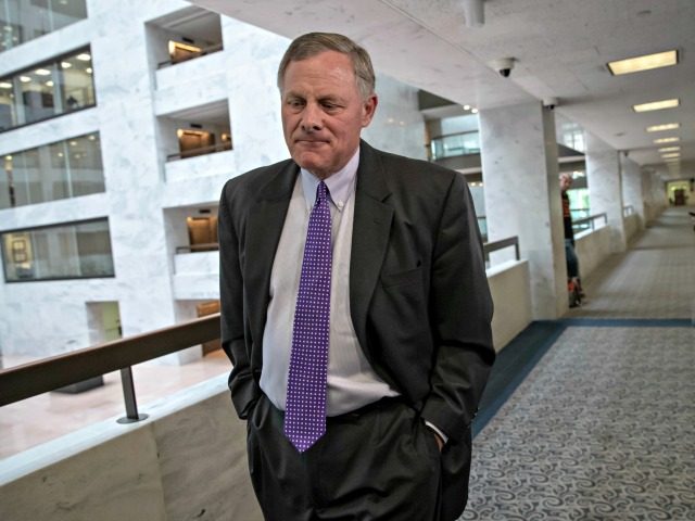 Senate Intelligence Committee Chairman Richard Burr, R-N.C., goes behind closed doors as m