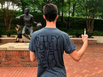 David Belnap, a sophomore at the University of North Carolina at Charlotte, displays a t-s