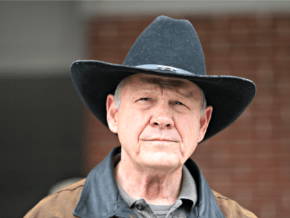 In this Dec. 12, 2017, file photo, Roy Moore speaks to the media after he rode in on a horse to vote in Gallant, Ala. Moore says he’s considering a fresh run for Senate in 2020. That’s prompting national Republican leaders to signal that they’d try again to prevent their …