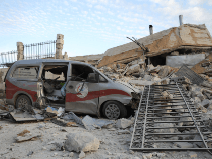 A picture taken on May 5, 2019 shows destruction at the entrance of a hospital in the village of Kafr Nabl, south of the jihadist-held Syrian province of Idlib. - Two hospitals in the Syrian province of Idlib, were put out of service by Russian air strikes according to the …