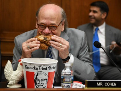 US Congressman Steve Cohen, Democrat of Tennessee, eats chicken as during a hearing before