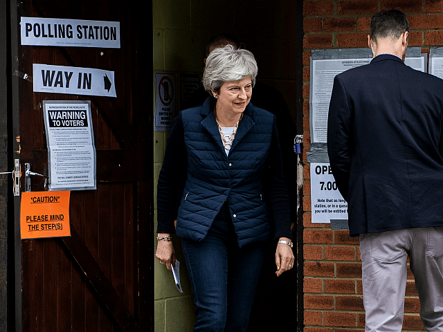 SONNING, ENGLAND - MAY 02: British Prime Minister Theresa May and her husband Philip leave after casting their votes at a polling station in the local council elections on May 2, 2019 in Sonning, England. Voters are heading to the polls today for council and mayoral elections across England and …