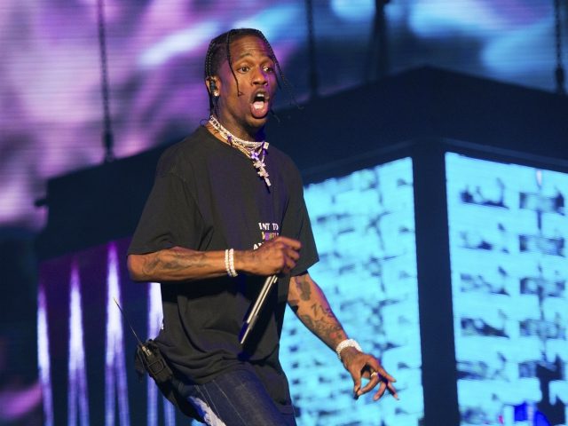FILE - In this June 2, 2018 file photo, rapper Travis Scott performs at The Governors Ball Music Festival in New York. Scott is in talks to perform at the Super Bowl halftime in Atlanta. A person familiar with the situation, who spoke on the condition of anonymity because they …