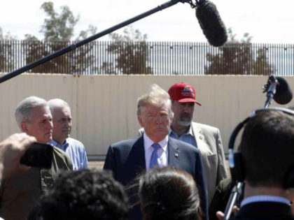 President Trump visits a new section of the U.S.-Mexico border in April 2019.