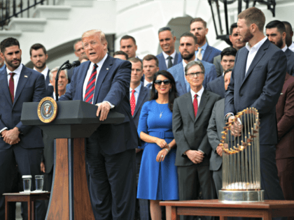 WASHINGTON, DC - MAY 09: U.S. President Donald Trump speaks as right fielder J.D. Martinez and pitch Chris Sale look on during a South Lawn event to honor the Boston Red Sox at the White House May 9, 2019 in Washington, DC. President Donald Trump hosted the Boston Red Sox …