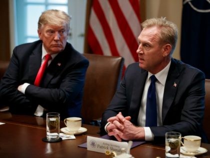 President Donald Trump listens as acting Secretary of Defense Patrick Shanahan speaks during an expanded bilateral meeting with NATO Secretary General Jens Stoltenberg in the Cabinet Room of the White House, Tuesday, April 2, 2019, in Washington. (AP Photo/Evan Vucci)
