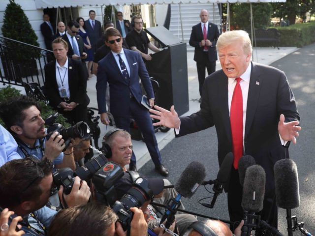 Trump with press (Win McNamee / Getty)