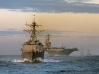PACIFIC OCEAN - JANUARY 26: In this handout image provided by the U.S. Navy, ships assigned to USS Abraham Lincoln Strike Group, trail behind the guided missile destroyer USS Momsen (DDG 92) during a straight transit exercise January 26, 2008 at sea. Ships and aircraft assigned to Carrier Strike Group …