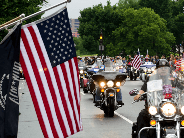 Participants in the Rolling Thunder annual motorcycle rally, ride past Constitution Avenue in Washington DC, May 28, 2017. Motorcyclists are in Washington for the traditional annual Rolling Thunder ahead of Memorial Day, May 29. / AFP PHOTO / Jose Luis Magana (Photo credit should read JOSE LUIS MAGANA/AFP/Getty Images)