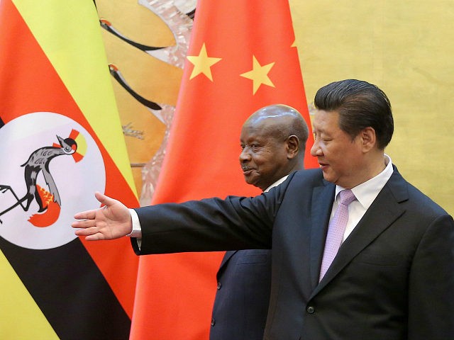 BEIJING, CHINA - MARCH 31: Ugandan President Yoweri Kaguta Museveni (L) and Chinese President Xi Jinping (R) attend a signing ceremony in the Great Hall of the People on March 31, 2015 in Beijing, China. (Photo by Feng Li - Pool/Getty Images)