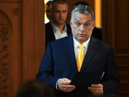 Hungarian Prime Minister Viktor Orban arrives to give his first international press conference on April 10, 2018 at the parliament building in Budapest, two days after his Fidesz party won the general elections. After a campaign centred on resistance to immigration and trumpeting a strong economy, nearly complete results showed …