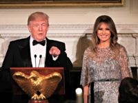 President Donald Trump with first lady Melania Trump, speaks during the White House Historical Association reception and dinner in the State Dining Room of the White House in Washington, Thursday, Sept. 14, 2017. (AP Photo/Manuel Balce Ceneta)